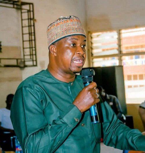 Mr Gong (inset) addressing the students at the programme