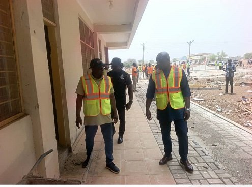 Mr Ndebilla (left) and Mr Ayamwego inspecting the project
