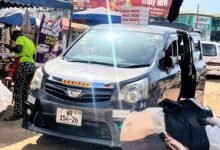A Toyota Voxy Car at the Kaneshie station