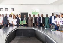 -Officials of the two institutions after signing the agreement