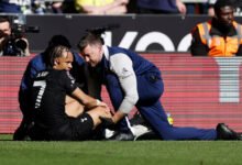 Xavi Simons receives medical attention after sustaining an injury Action