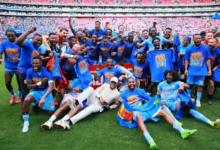 • DR Congo's players celebrate qualifying for the FIFA World Cup