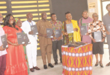• Ms Amarteifio (fourth from right), Mr Herbert Malm (fourth from left), Ms Efua Houadjeto (second from left) and other guests launching the Strategic Plan document. Photo.Ebo Gorman