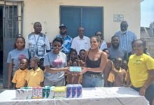 • Ms Melinda Gosda, assistant nurse at Street Academy Health Post (right), receiving some of the medical supplies from Mrs Abba-Opoku
