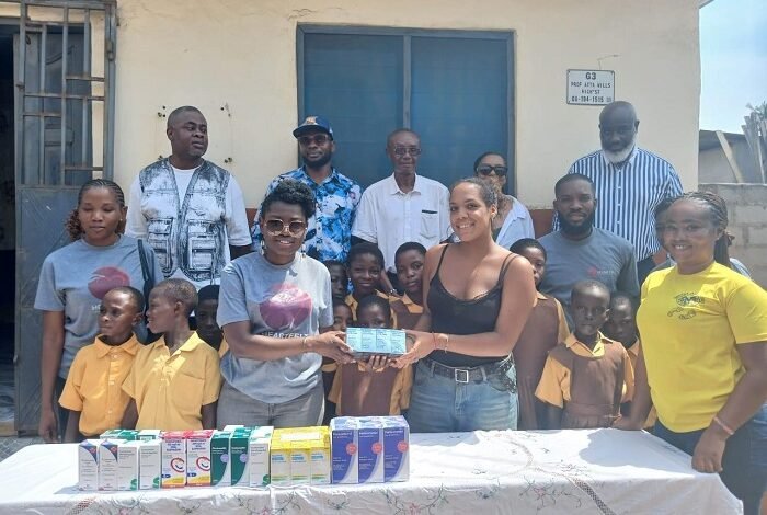 • Ms Melinda Gosda, assistant nurse at Street Academy Health Post (right), receiving some of the medical supplies from Mrs Abba-Opoku