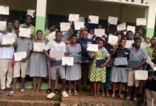 - Mr Seneadza (middle) with the beneficiary students after the training