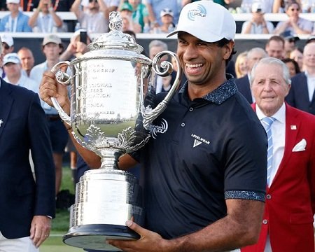 Aaron Rai holds the Wanamaker Trophy after winning the PGA Championship.
