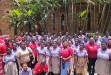 Absa Bank staff with HOTCASS students