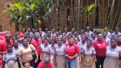 Absa Bank staff with HOTCASS students