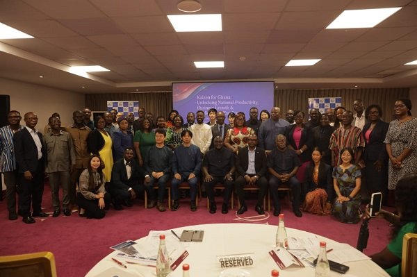 Mr Julius Debrah (middle) with participants during the high-level awareness seminar