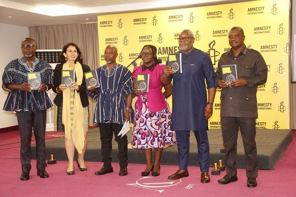 Mr Nyantakyi (third from left) with Ms Osei (third from right) and other officials launching the report. Photo Elizabeth Okai