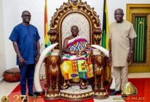 Mr Adjei (right) with Otumfuo Osei Tutu II, Asantehene (seated)