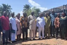 Mr Jamal (seventh from left) with officials of the Assembly after the donation