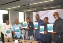 Mrs Asante-Asiedu (third from left), Mr James Klutse Avedzi (right) and other guests launching the report. Photo. Ebo Gorman