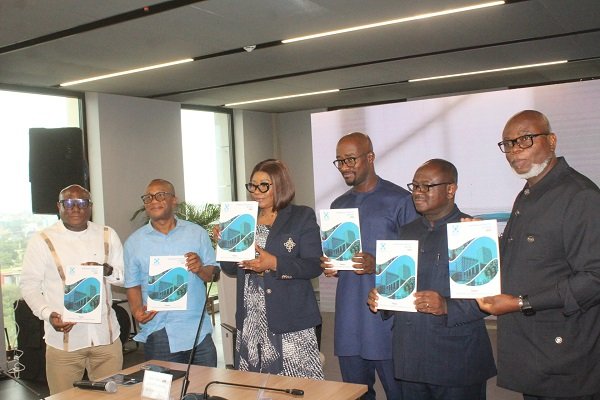 Mrs Asante-Asiedu (third from left), Mr James Klutse Avedzi (right) and other guests launching the report. Photo. Ebo Gorman