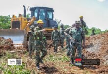 CDS Lieutenant General, William Agyapong (righ) being briefed during his visit to the site