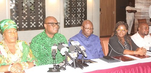 Mr Madjie (second from left) addressing the press. With him include Mr Oppong-Fosu (third from right), Board Chairman, GIPC
