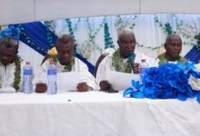 Mr Mills (fourth from left) with elders of the Awo-Nancy We family