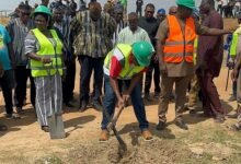 Dr Apaak cutting sod for the construction of the market