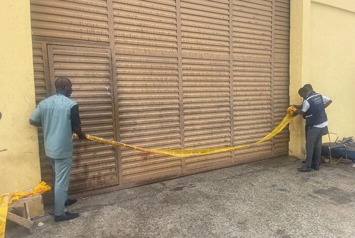 GRA taskforce locking a warehouse during the operation