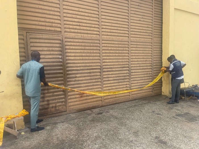 GRA taskforce locking a warehouse during the operation