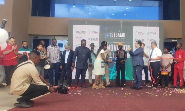 Mr Akmermer (fourth from right) and Okyeame Kwame (fifth from right) after cutting the tape to open the Annual Science and Makers’ Fair