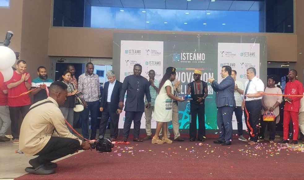 Mr Akmermer (fourth from right) and Okyeame Kwame (fifth from right) after cutting the tape to open the Annual Science and Makers’ Fair