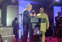 Mr Gilad (left), proposing a toast with Mr Adjei (right) at the event