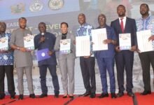 Mr Isaac Adongo (fourth from left), Dr Iddrisu (fifth from right), Dr. Agyeman-Rawlings (middle) and other invited guests launching the report. Photo. Ebo Gorman