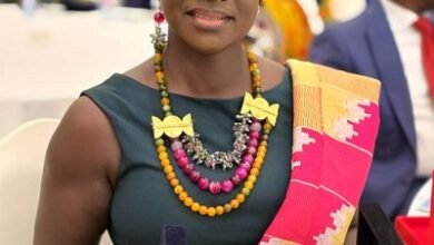 Ms Agnes Opoku Sarpong displaying her Awards