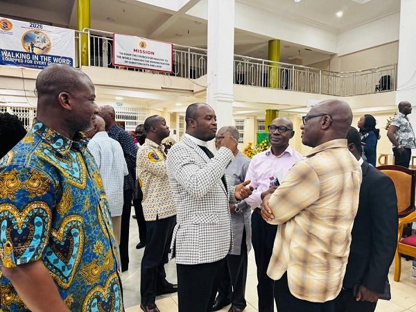 Very Rev. Nortey (middle) interacting with some members of the Airport East Circuit Men’s Fellowship after the lecture
