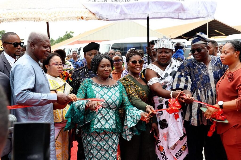 • Vice President Opoku-Agyemang (third from left) cutting the tape to inaugurate the new MMT buses. With her is Mr Joseph Bukari Nikpe, Transport Minister (left) and other dignitaries