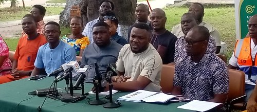 Mr Ziyad (second from right) addressing the press