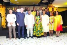 -Mr George (third from left, front row), with Mr Blewett (second from left) and MTN senior management members
