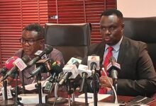 Mr Afful (right) speaking at the Majority press conference