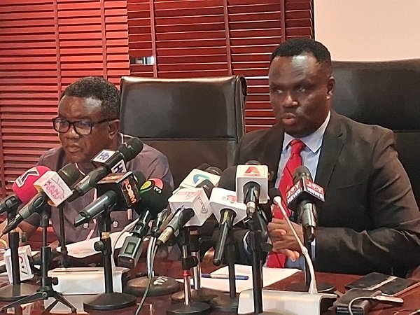 Mr Afful (right) speaking at the Majority press conference