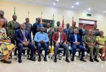 Mr Brogya Genfi (seated middle) with members of the board after the inauguration