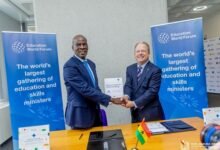 Mr Iddrisu (left) exchanging the signed document with Mr Kells at the ceremony