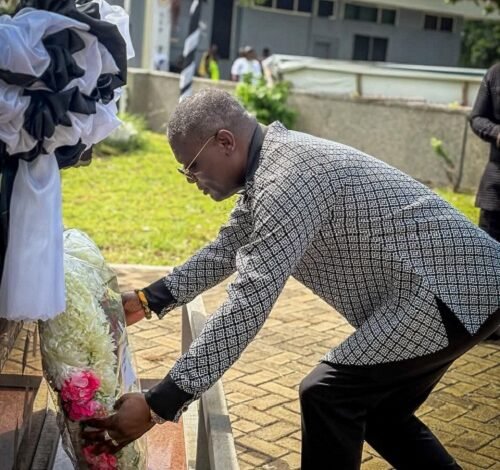 Mr Kofi Adams lays a wreath to commemorate the Silver Jubilee of the May 9 tragedy