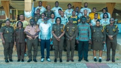 Ms Baffoe-Bonnie with officers and armwrestlers after the launch