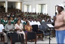 Mrs Budu-Nyarko (standing) addressing participants at the programme
