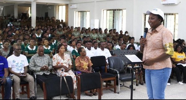 Mrs Budu-Nyarko (standing) addressing participants at the programme