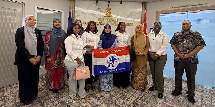 Members of NPP Loyal Ladies with the Malaysian team