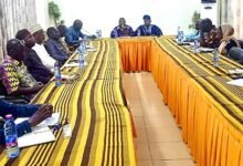 Mr Mburidiba (arrowed) with the heads of departments and agencies at the meeting
