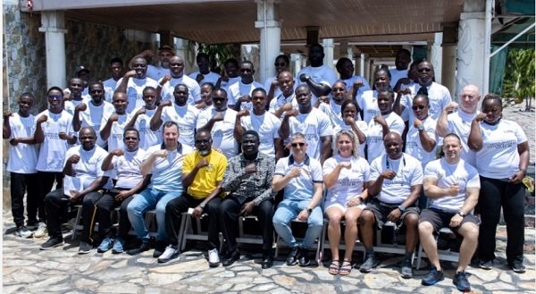 Officials and participants after the training workshop