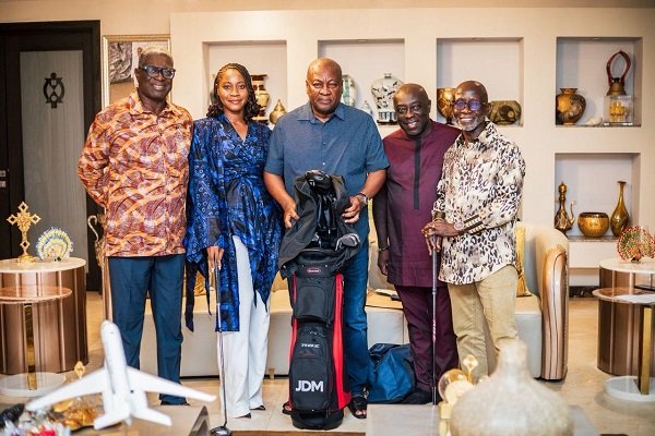• President Mahama (middle) with Mike Aggrey (left) and other members of the Head of State Golf Planning Committee