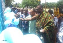 Dr Dzoboku (second from right) being supported by Togbe Agyemang (right), and Mr Gunu to commission the facility
