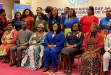 Dr Lartey (seated fourth from left) with participants after the event