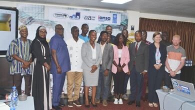Mr Asante-Twum (fourth from left) with Ms Anti (sixth from right) and other participants during the stakeholders dialoque. ,