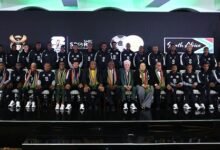 South Africa president Cyril Ramaphosa, coach Hugo Broos with the squad and other officals after the announcement